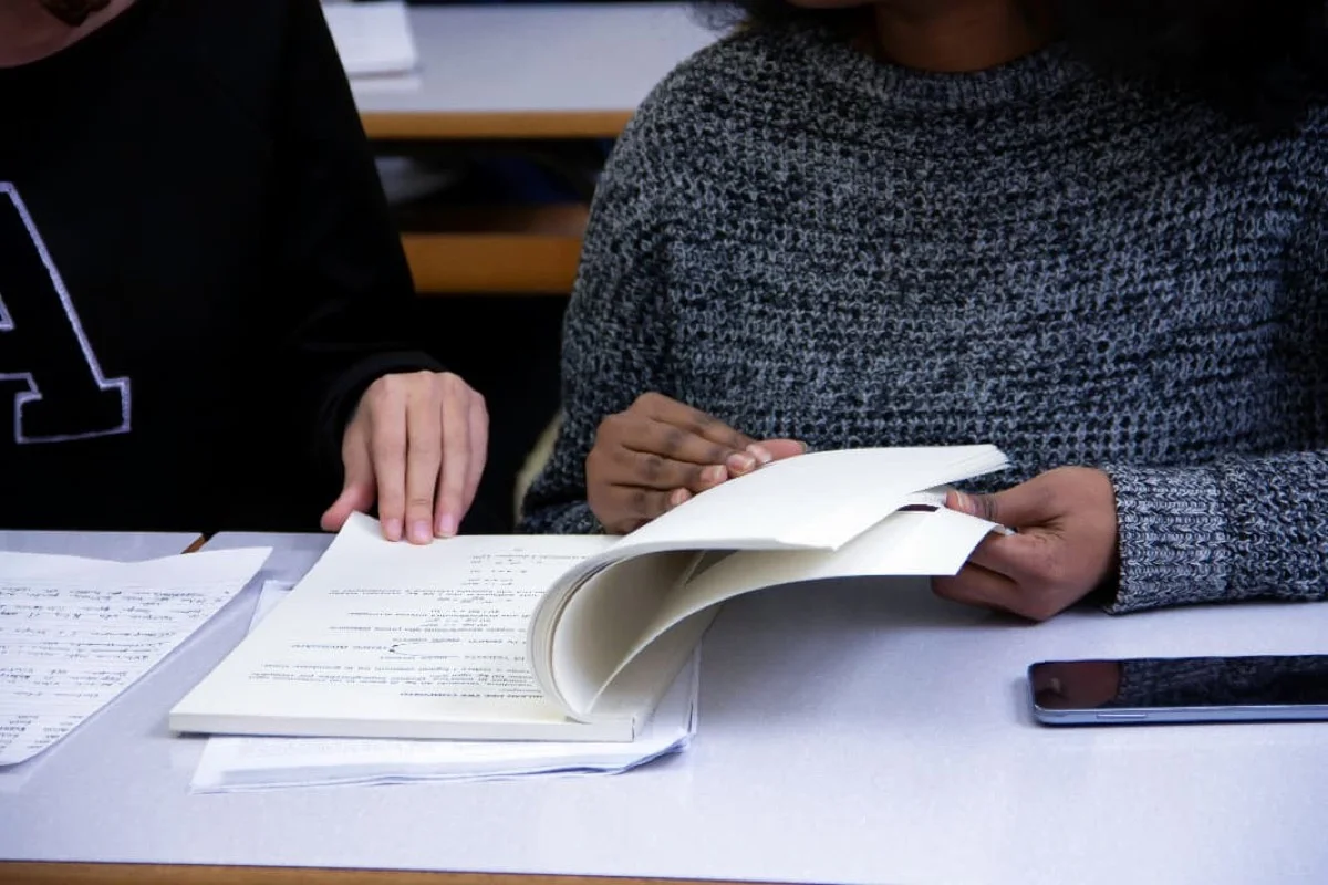 Tutor reviewing an IGCSE maths student’s working step by step during a one to one session